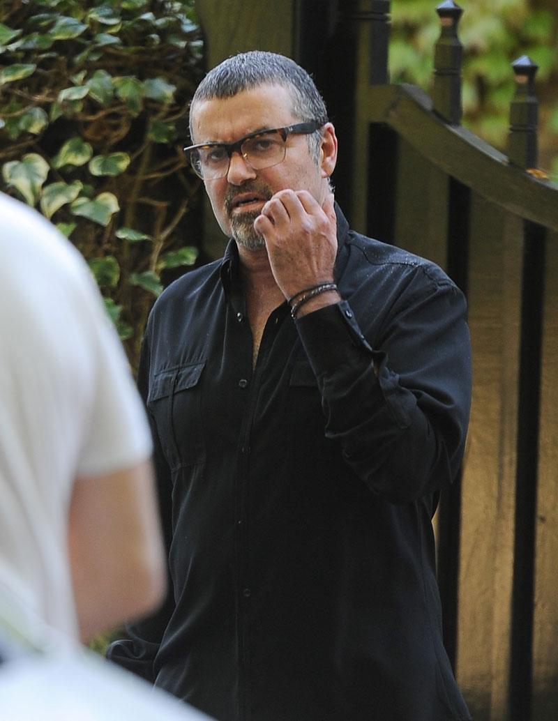 //george michael dead london home mystery visitors police investigation